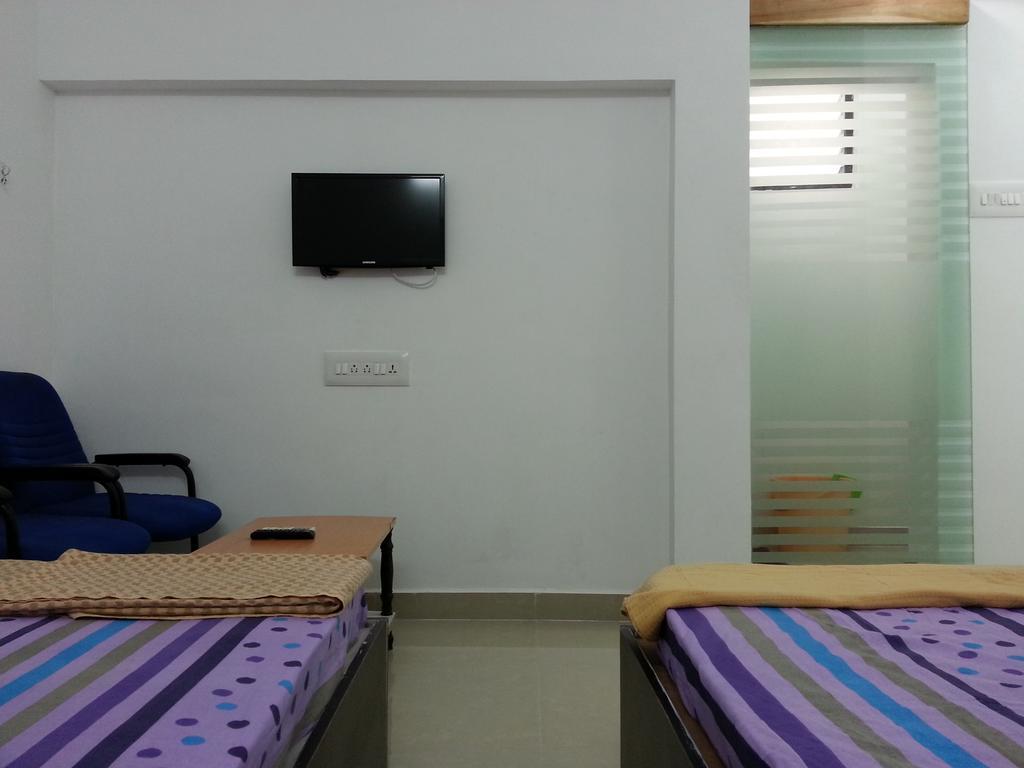 Srirangam Suit Rooms Tiruchirappalli Δωμάτιο φωτογραφία